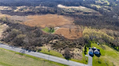 Photo of 8770 W Henrietta Road, Rush, NY 14543 (MLS # R1672783)