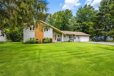 Photo of 105 Merryhill Drive, Penfield, NY 14625 (MLS # R1709254)