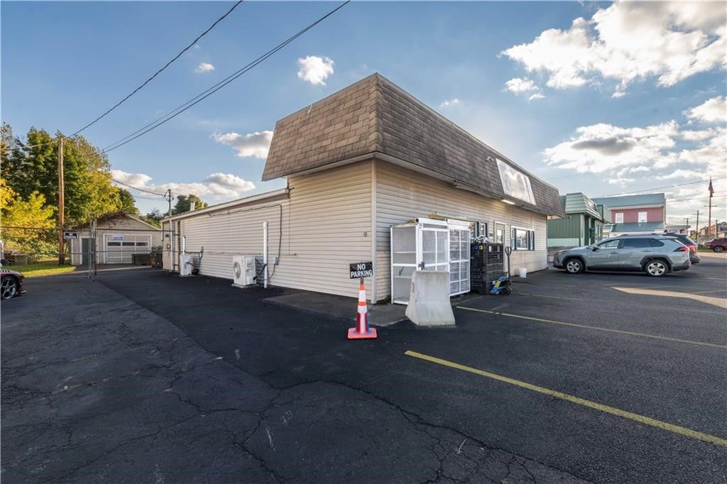 Photo of 306 E Center Street, Ridgeway, NY 14103 (MLS # R1643612)