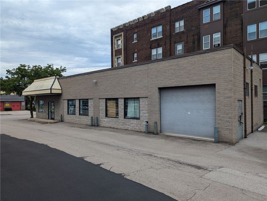 Photo of 691 E Main Street, Rochester, NY 14605 (MLS # R1550363)