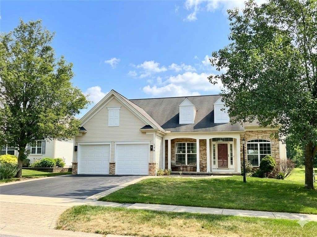 Photo of 136 New Tudor Road, Henrietta, NY 14534 (MLS # R1699152)