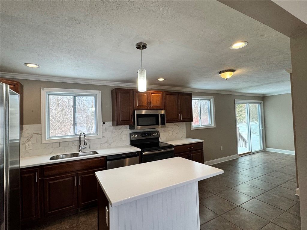 Photo of 496 Pebbleview Drive, Greece, NY 14612 (MLS # R1659659)