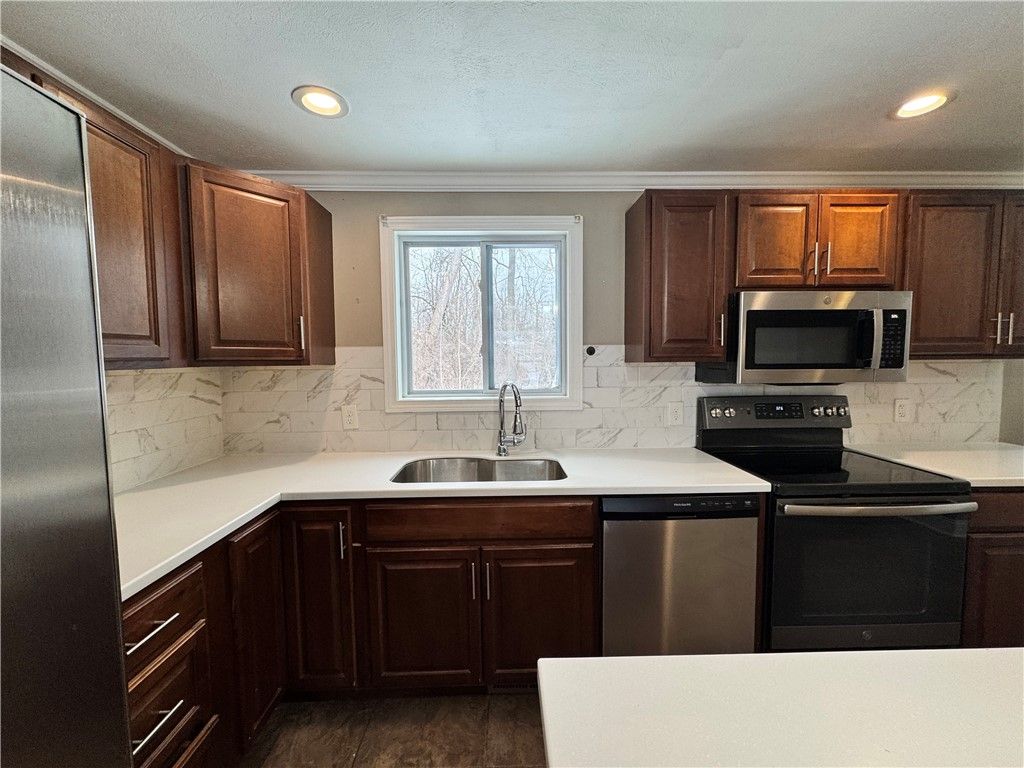 Photo of 496 Pebbleview Drive, Greece, NY 14612 (MLS # R1659659)