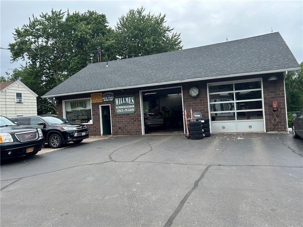 Photo of 1430 Ridge Road, Webster, NY 14580 (MLS # R1628392)