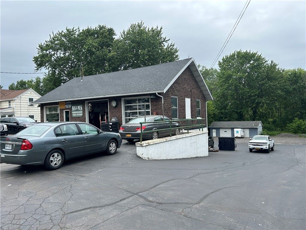 Photo of 1430 Ridge Road, Webster, NY 14580 (MLS # R1628392)