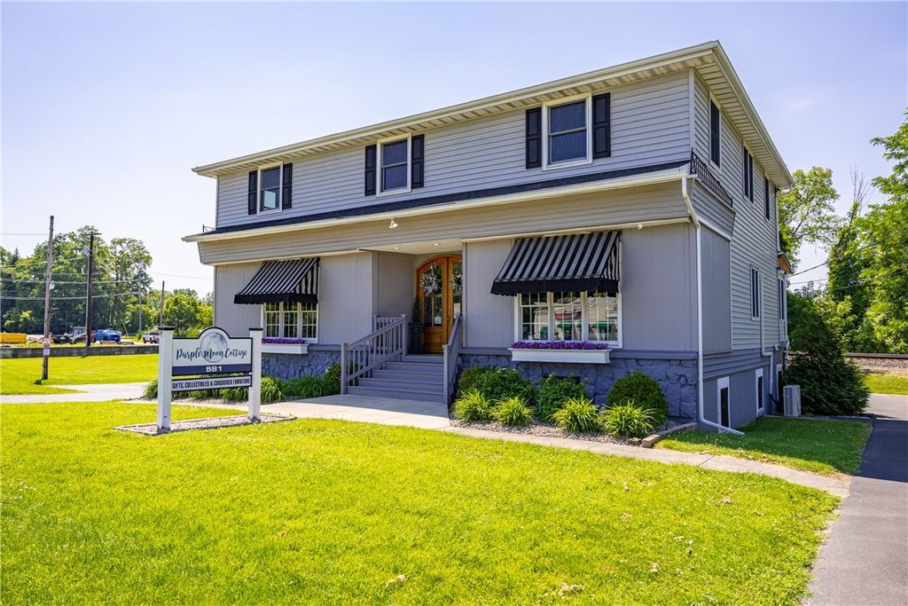 Photo of 581 Whitney Road W, Perinton, NY 14450 (MLS # R1695522)