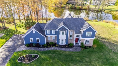 Photo of 64 Woodfield Drive, Penfield, NY 14580 (MLS # R1647477)