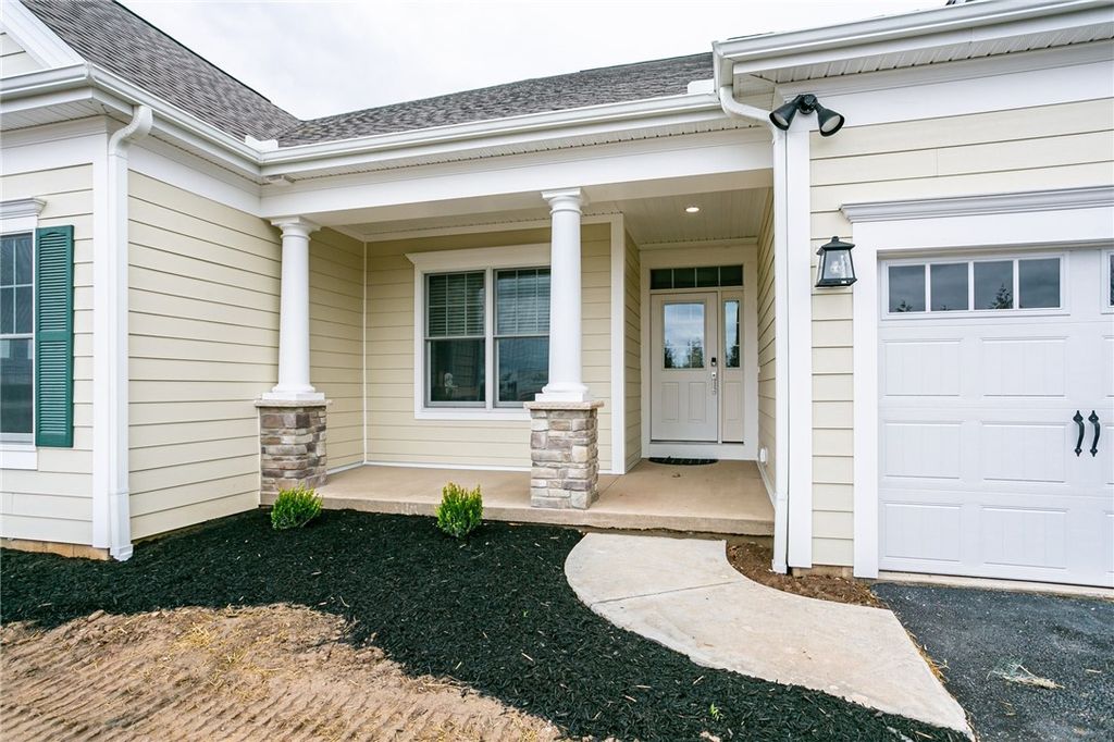 Photo of 243 Bretlyn Circle, Brighton, NY 14618 (MLS # R1678124)