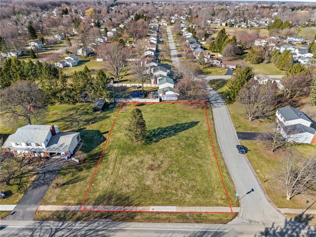 Photo of 668 Embury Road, Penfield, NY 14625 (MLS # R1668523)