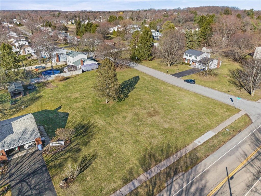 Photo of 668 Embury Road, Penfield, NY 14625 (MLS # R1668523)