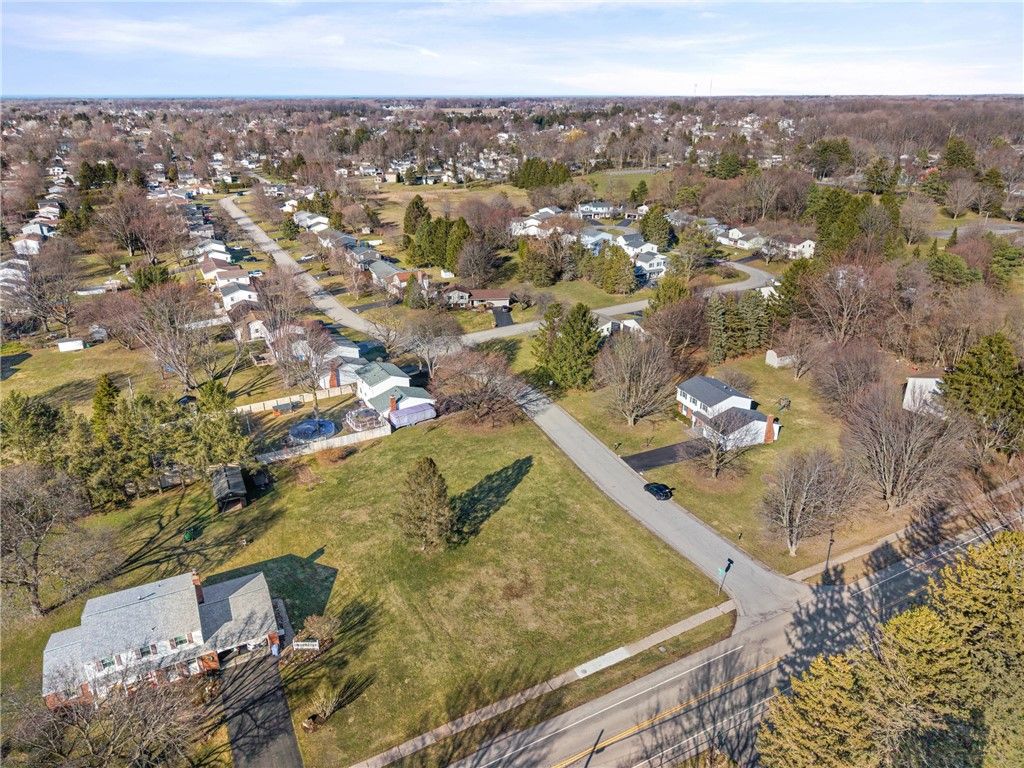 Photo of 668 Embury Road, Penfield, NY 14625 (MLS # R1668523)