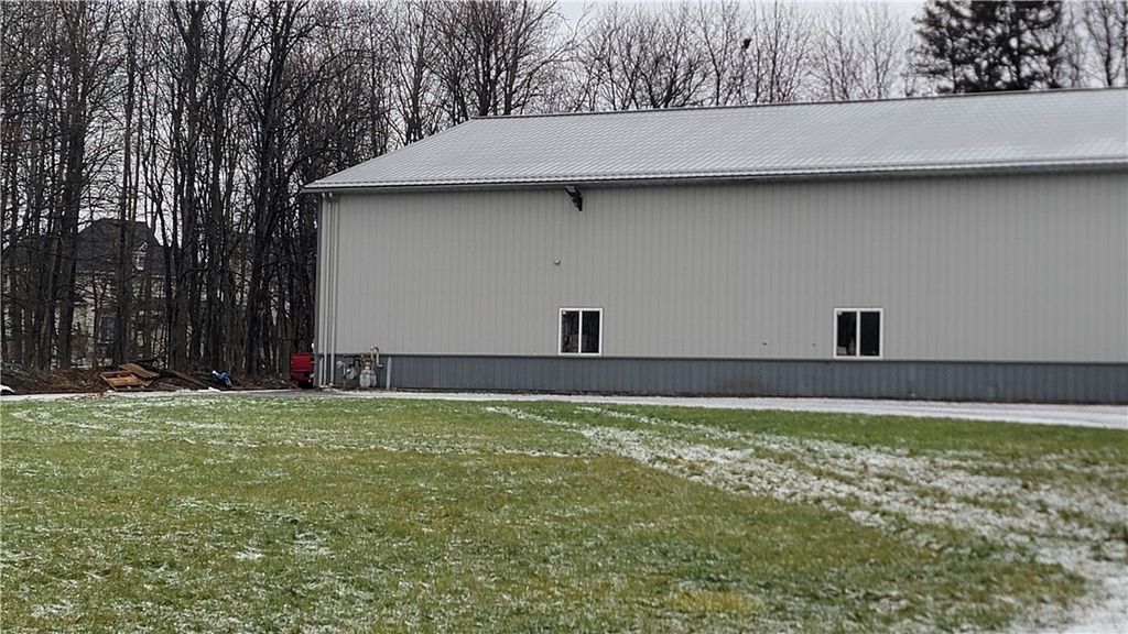 Photo of 1744 State Route 104 Highway #2, Ontario, NY 14519 (MLS # R1657838)