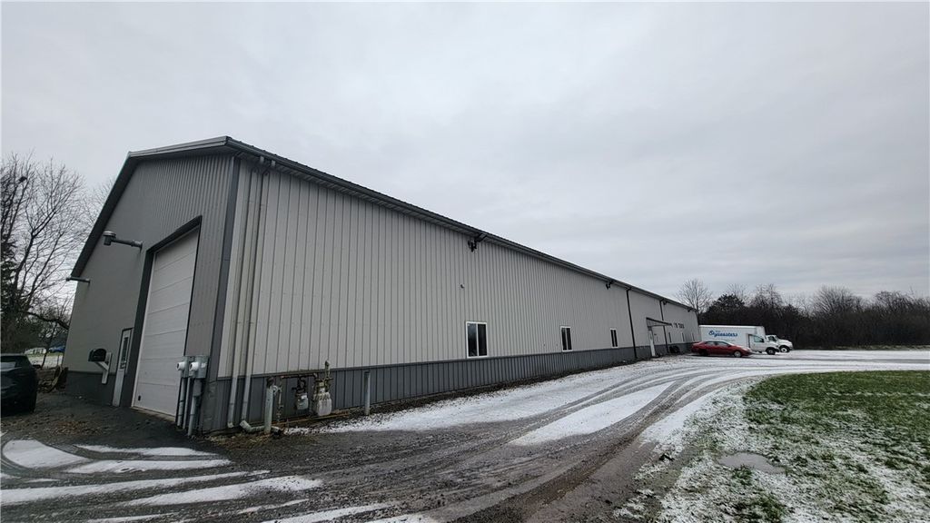 Photo of 1744 State Route 104 Highway #2, Ontario, NY 14519 (MLS # R1657838)