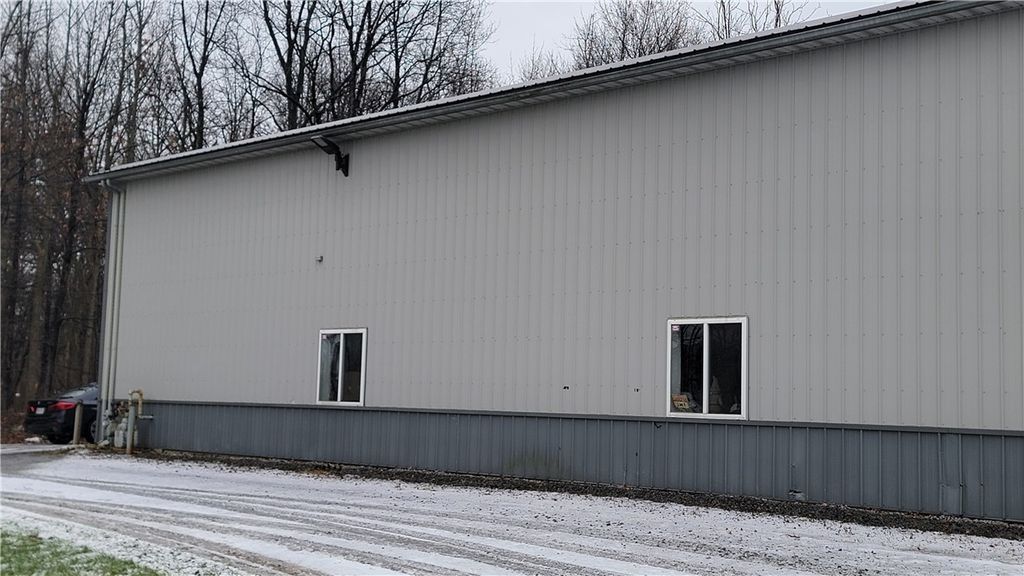 Photo of 1744 State Route 104 Highway #2, Ontario, NY 14519 (MLS # R1657838)