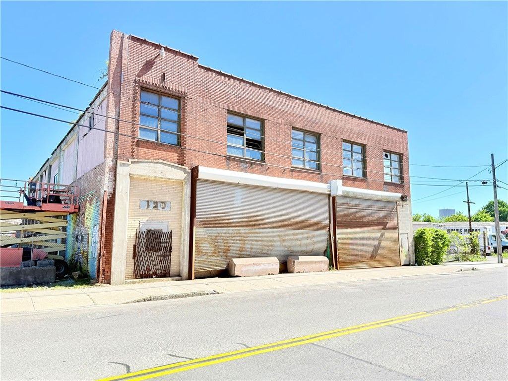 Photo of 120 Portland Avenue, Rochester, NY 14605 (MLS # R1695195)