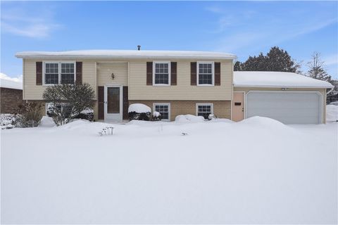 Photo of 95 Spring Tree Lane, Greece, NY 14612 (MLS # R1659357)
