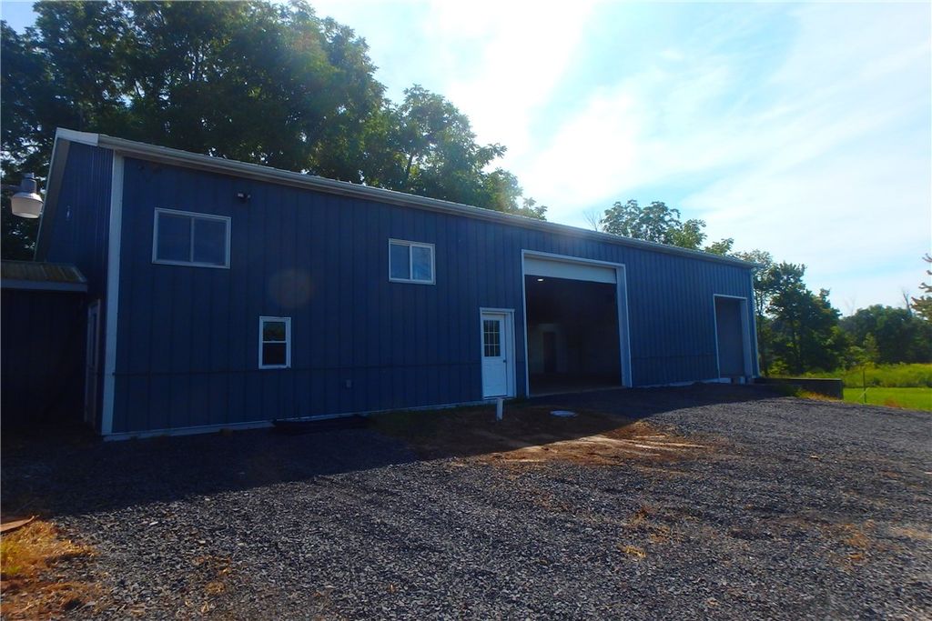 Photo of 8251 Rt-104A, Wolcott, NY 14590 (MLS # R1635621)