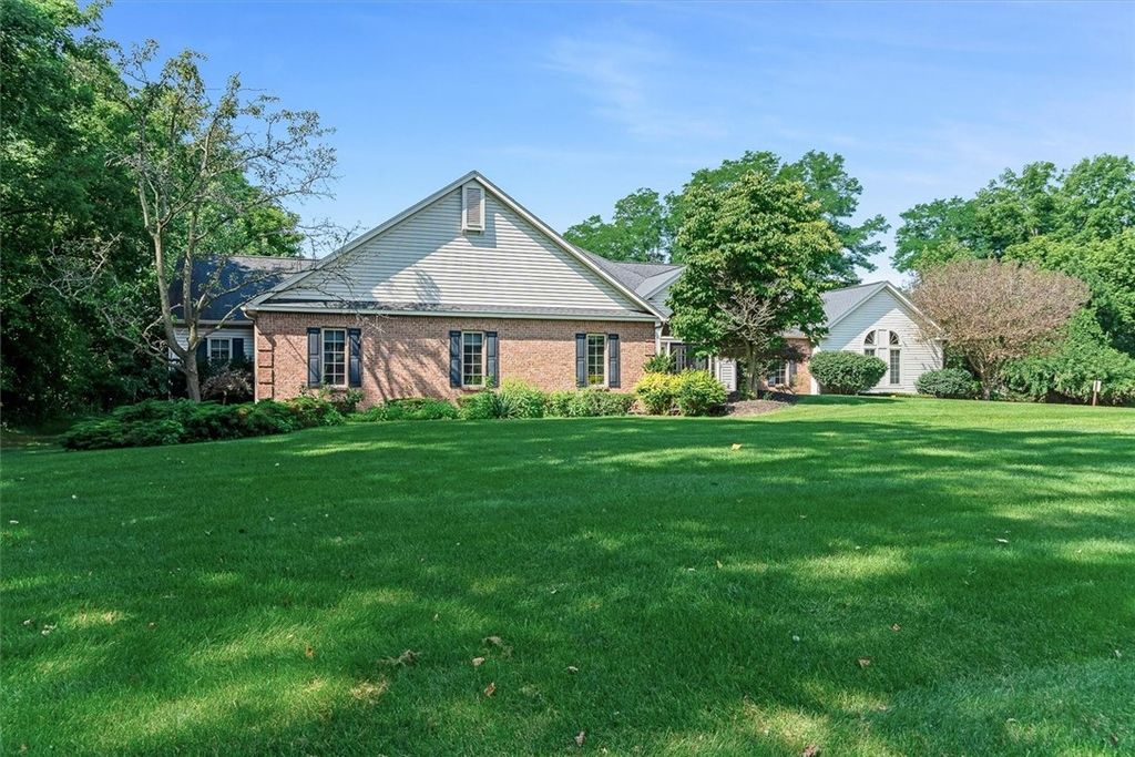 Photo of 55 Sullys Trail #C, Pittsford, NY 14534 (MLS # R1554731)