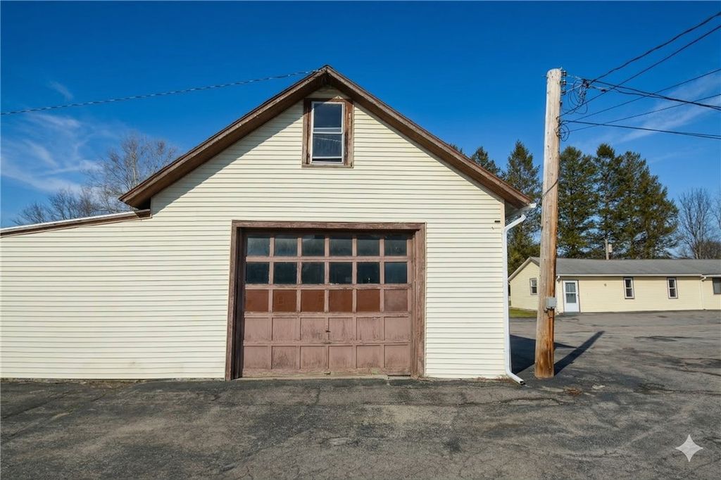 Photo of 4395 Nine Mile Point Rd - Unit N Road, Perinton, NY 14450 (MLS # R1667490)