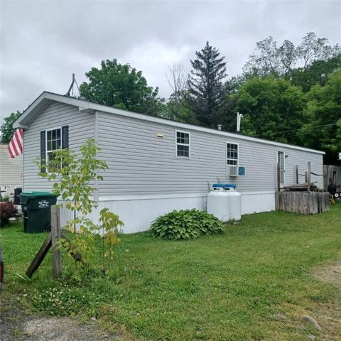 Photo of 124 Millers Park Road, Norwich, NY 13815 (MLS # R1653318)