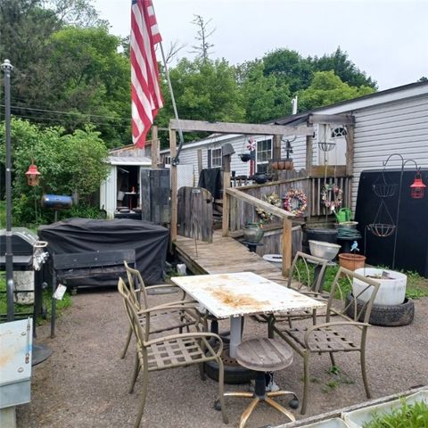 Photo of 124 Millers Park Road Park, Norwich, NY 13815 (MLS # R1653318)