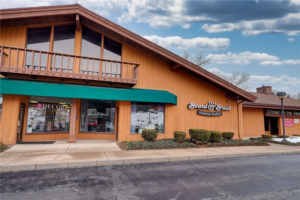 Photo of 900 Panorama Trail S, Penfield, NY 14625 (MLS # R1668150)