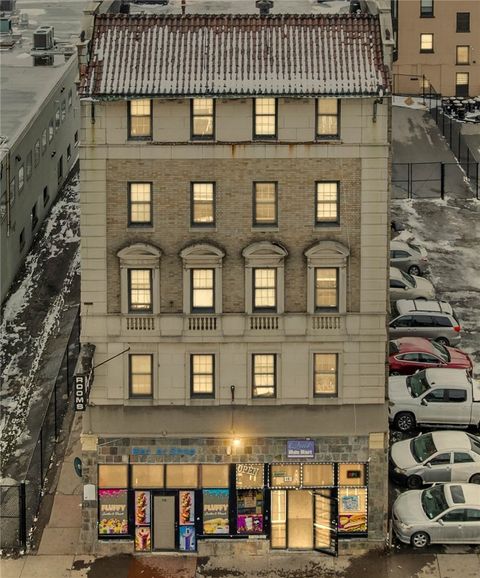 Photo of 113 N Clinton Avenue, Rochester, NY 14604 (MLS # R1670132)