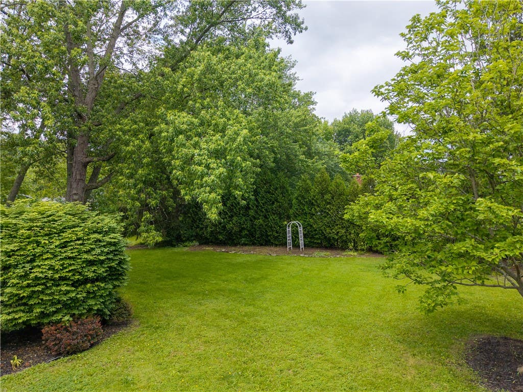 Photo of 20 Paddington Drive, Gates, NY 14624 (MLS # R1695188)