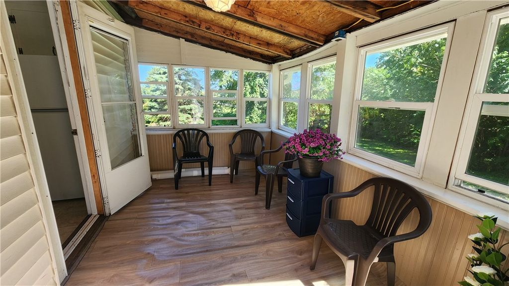 Photo of 1128 Ridge Road, Webster, NY 14580 (MLS # R1641844)