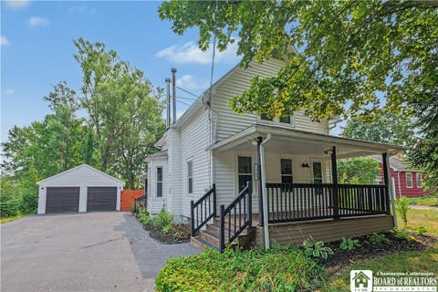 Photo of 1369 Sturgeon Point Road, Evans, NY 14047 (MLS # R1702048)