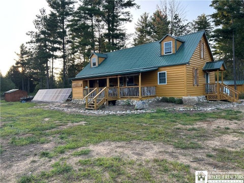 Photo of 135 County Route. 39, Massena, NY 13662 (MLS # R1711046)