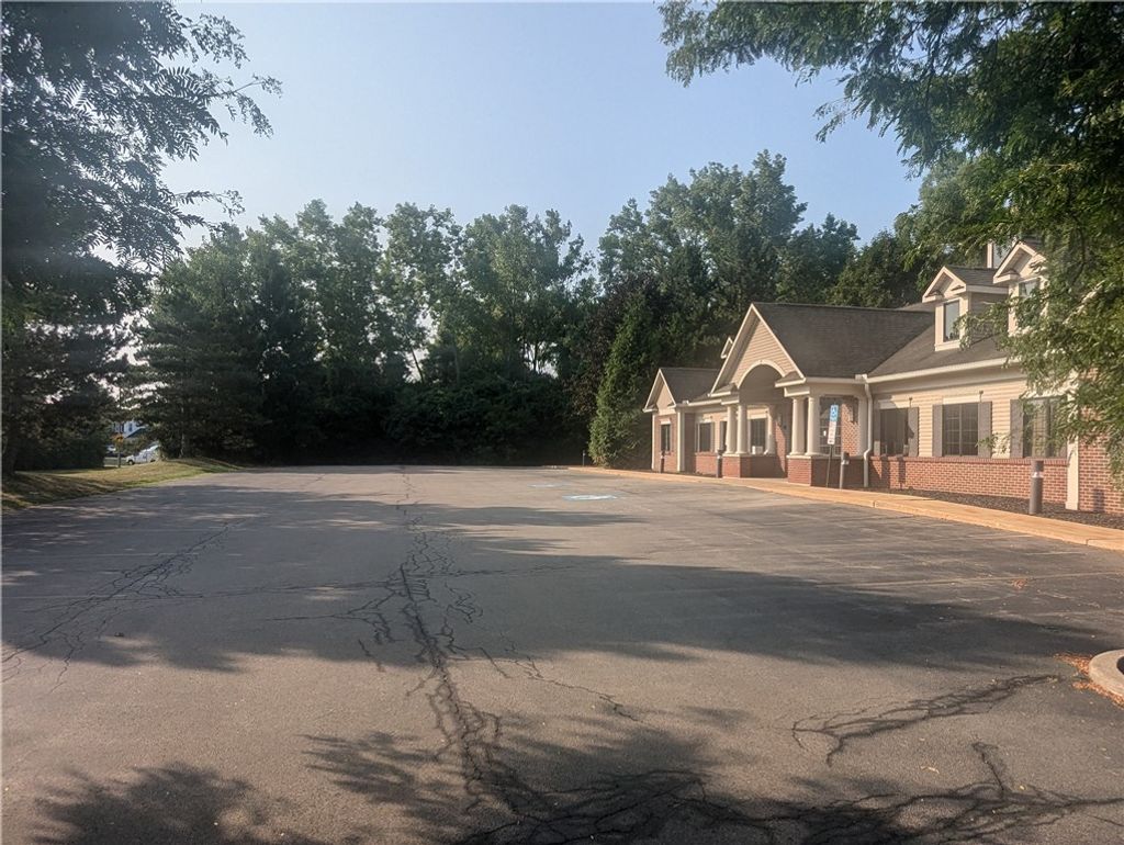 Photo of 2601 Lac DeVille Boulevard, Brighton, NY 14618 (MLS # R1628177)