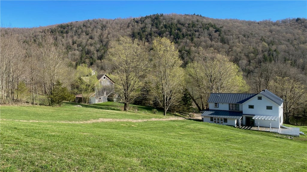 Photo of 611 Faulkner Road, Tompkins, NY 13856 (MLS # R1710278)