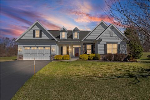 Photo of 77 Stonefield Mews Lane, Henrietta, NY 14534 (MLS # R1669010)