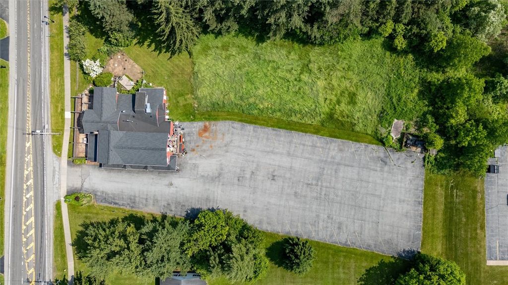 Photo of 1369 Pittsford Mendon Road, Mendon, NY 14506 (MLS # R1645626)