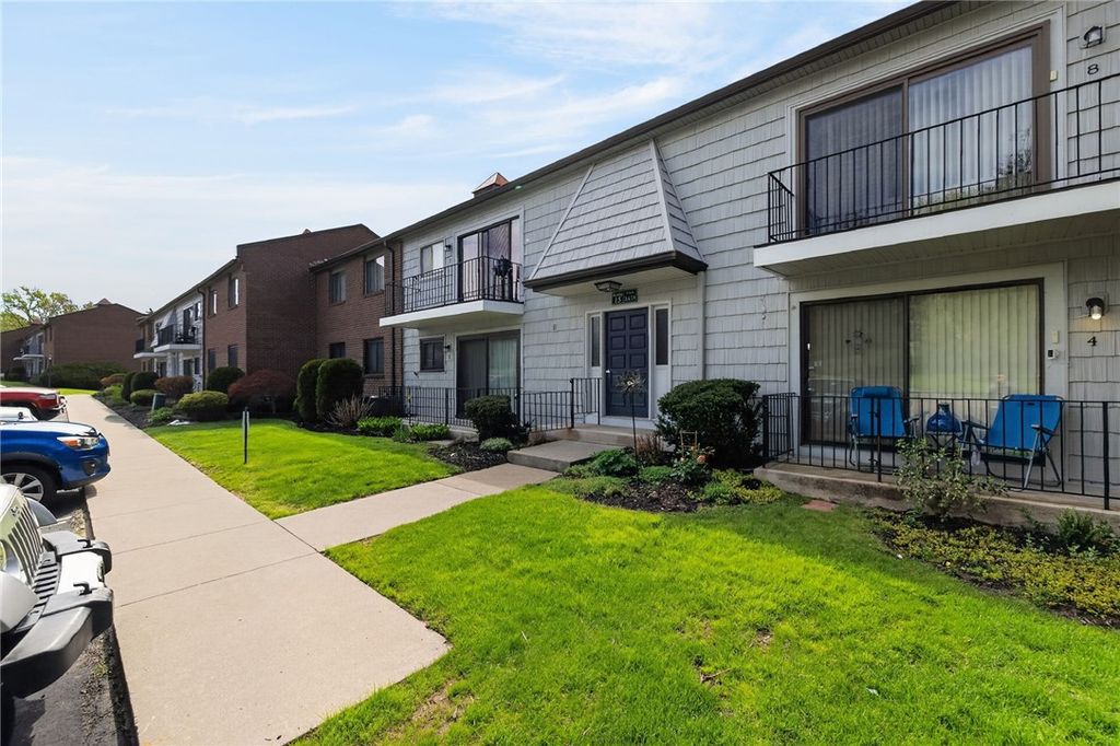 Photo of 15 High Gate Unit #8 TRL, Perinton, NY 14450 (MLS # R1678923)