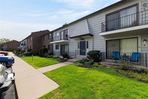 Photo of 15 High Gate Unit #8 TRL, Perinton, NY 14450 (MLS # R1678923)