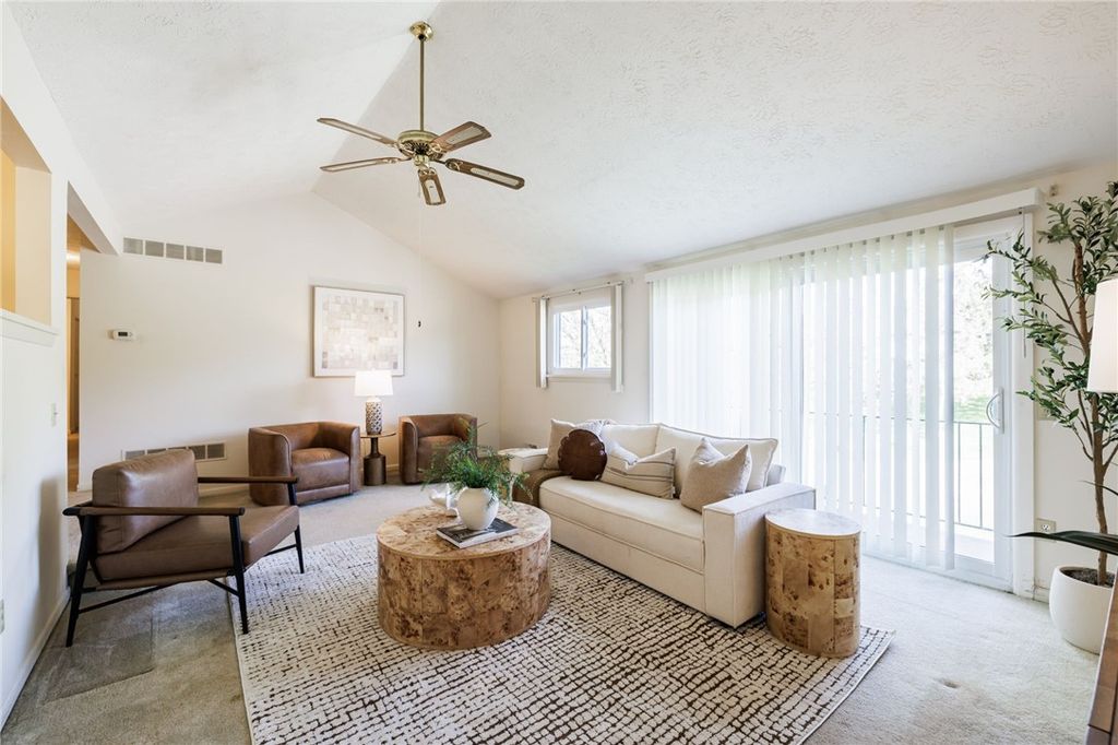 Photo of 15 High Gate Unit #8 TRL, Perinton, NY 14450 (MLS # R1678923)