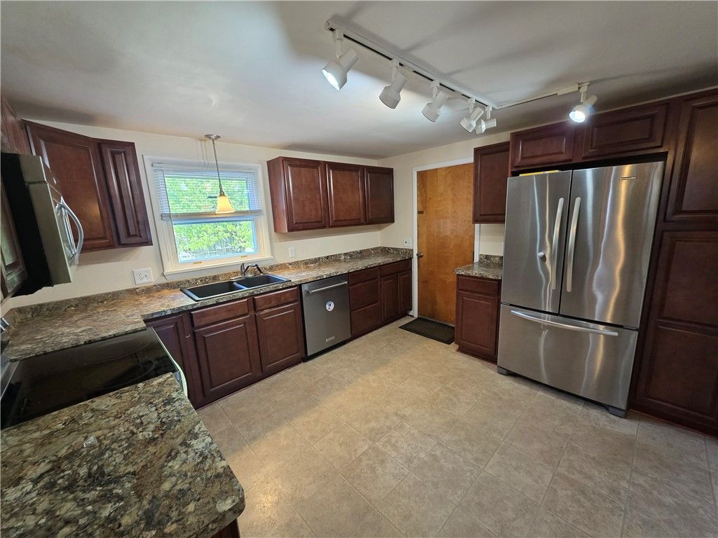 Photo of 264 Harvest Drive, Greece, NY 14626 (MLS # R1644043)