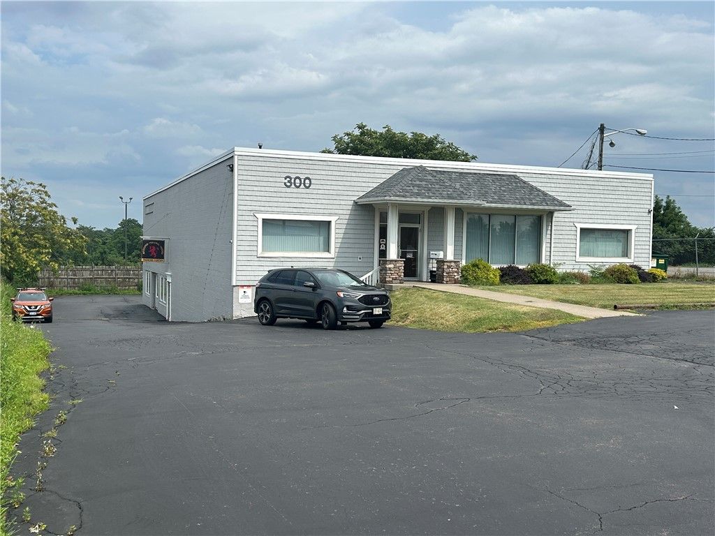 Photo of 300 Buell Road, Gates, NY 14624 (MLS # R1625457)