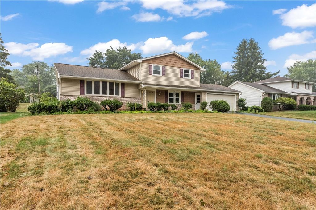 Photo of 75 Old Meadow Drive, Greece, NY 14626 (MLS # R1632304)