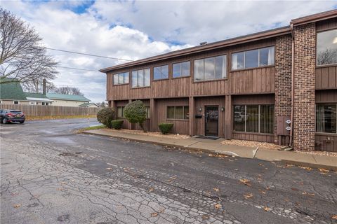 Photo of 1880-1 E Ridge Road, Irondequoit, NY 14622 (MLS # R1655127)