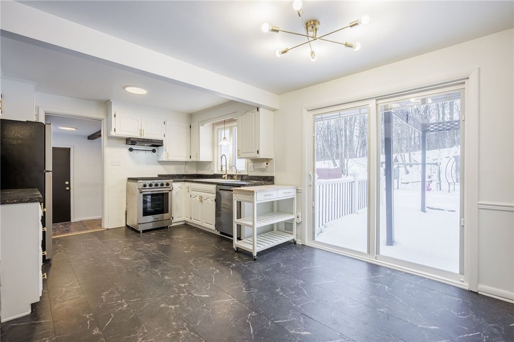 Photo of 105 Chestnut Drive, Chili, NY 14624 (MLS # R1657582)