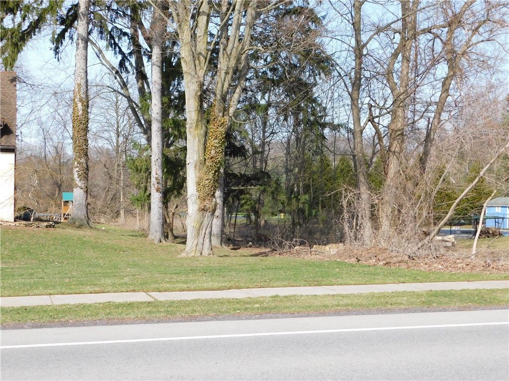 Photo of 1573 Creek Street, Penfield, NY 14625 (MLS # R1669184)