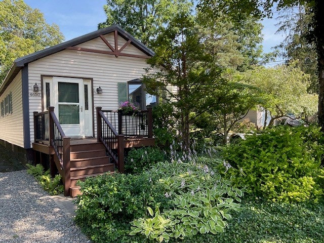 Photo of 4650 E Lakeview Drive, Owasco, NY 13021 (MLS # R1704592)