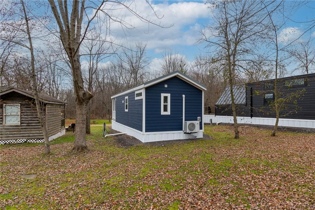 Photo of 7150 GARNER #3 Rd, Huron, NY 14590 (MLS # R1666311)