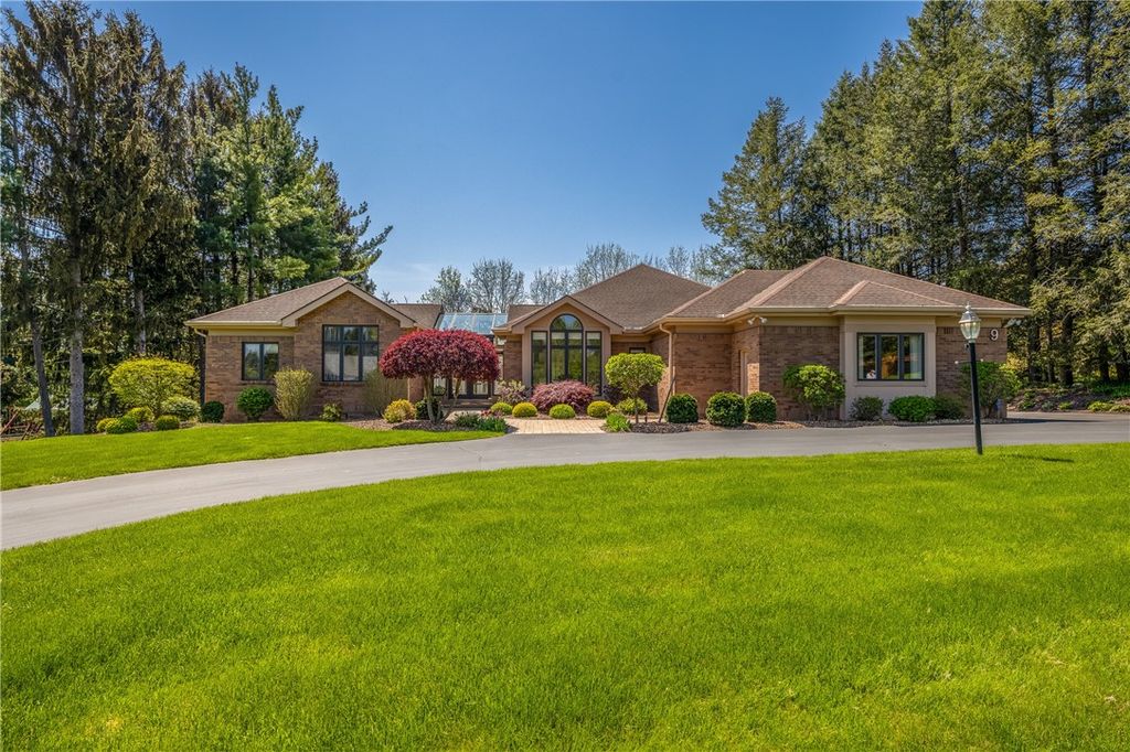 Photo of 9 Abbey Woods, Pittsford, NY 14534 (MLS # R1693533)