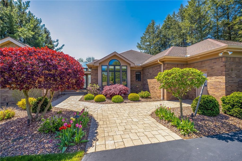 Photo of 9 Abbey Woods, Pittsford, NY 14534 (MLS # R1693533)