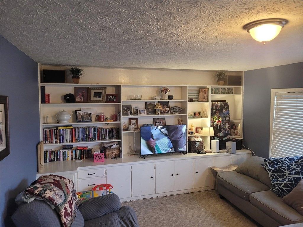 Photo of 1680 Fairport Nine Mile Point Road, Penfield, NY 14526 (MLS # R1668796)