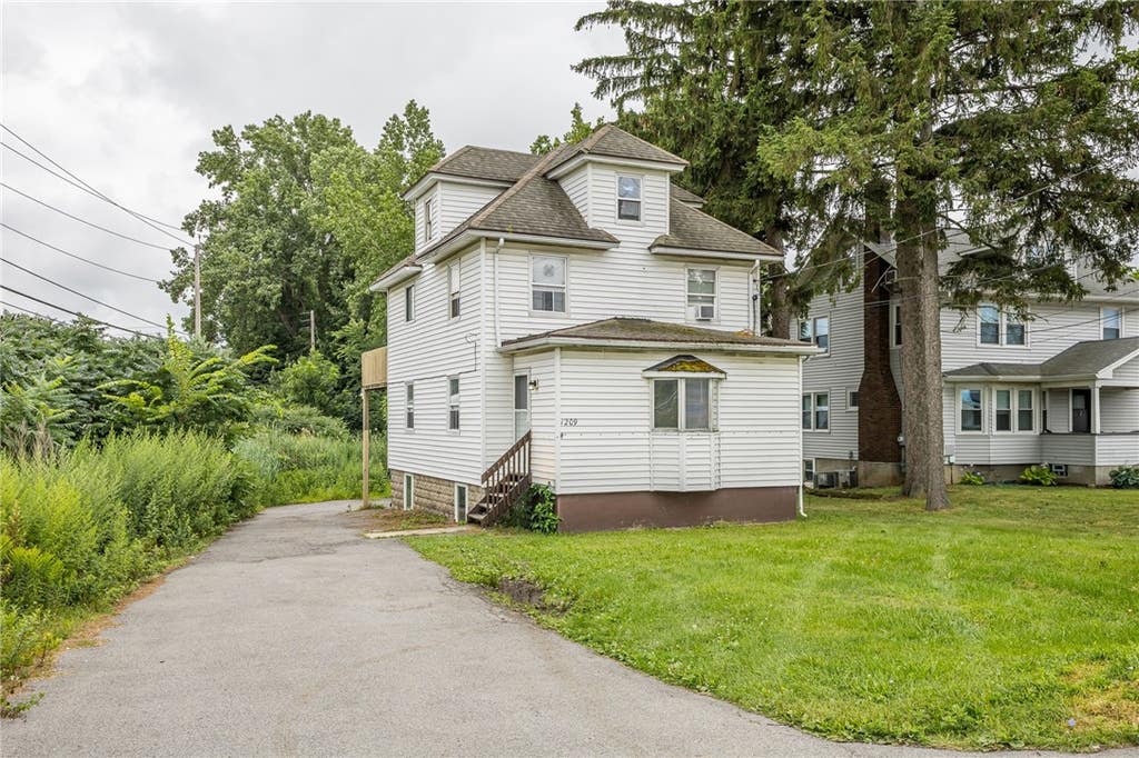 Photo of 1209 Ridge Road, Webster, NY 14580 (MLS # R1702408)